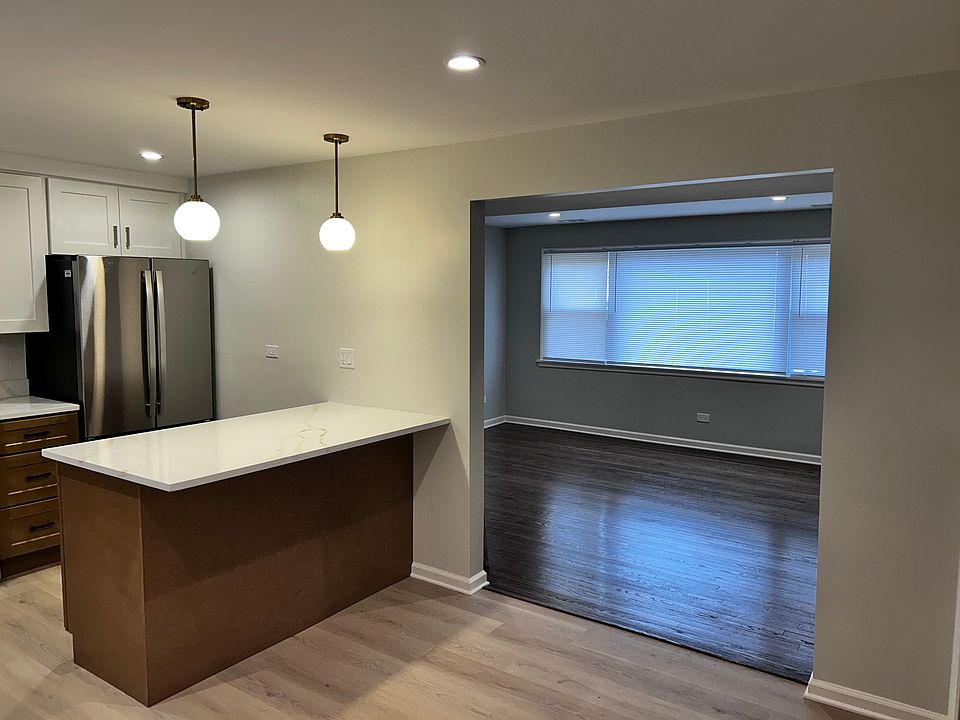 Brand new eat-in kitchn with diswasher and quartz counters