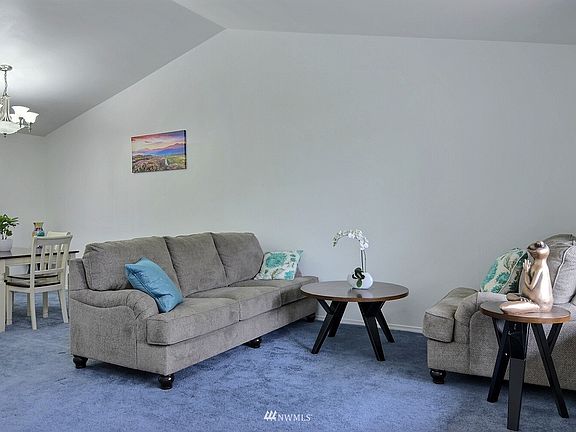 great room with vaulted ceiling >