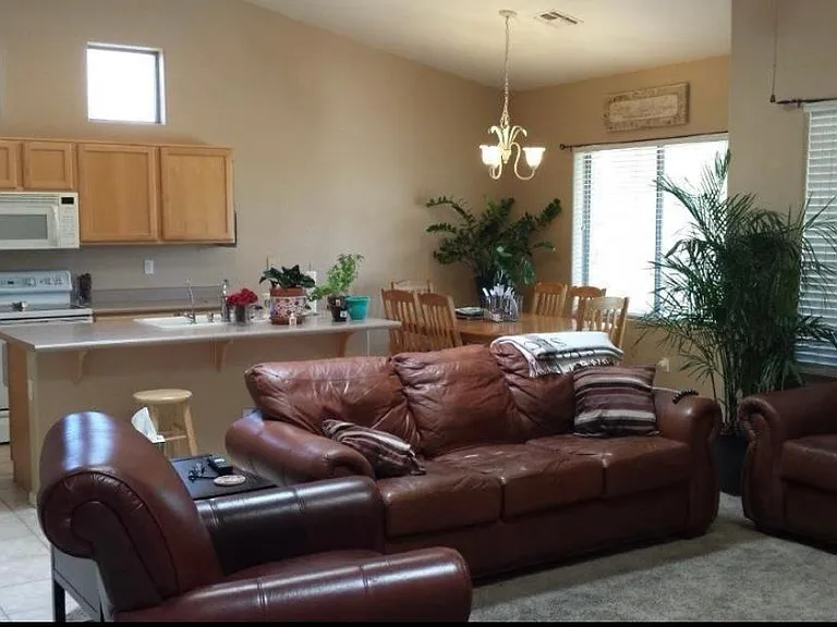 kitchen, eating area, and family room before remodel