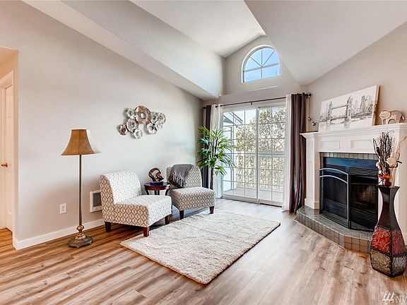 Upon entry of this top floor unit, you will immediately notice the vaulted ceilings, fresh paint, and new floors.