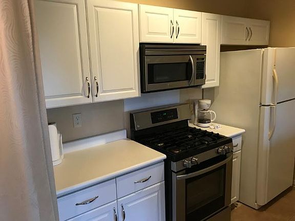 Kitchen with new oven and microwave