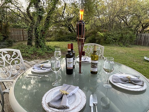 Enjoy outdoor dining in the fully fenced backyard.