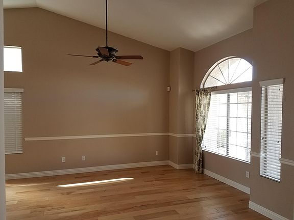 Front Room with ceil fans and new hardwood floors.