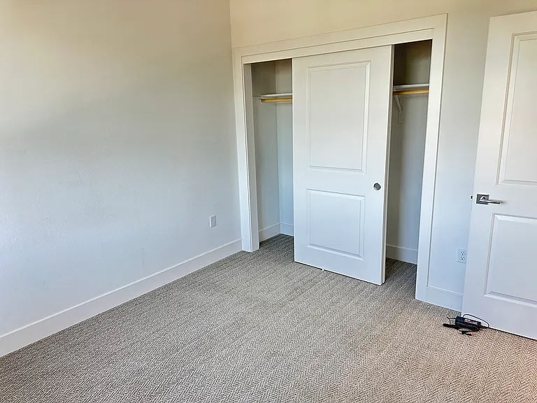 Third Floor - 3rd bedroom with a sliding door closet