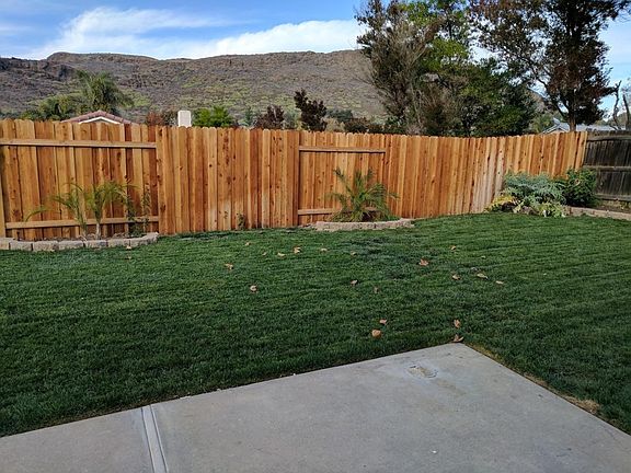Yard with view of hills