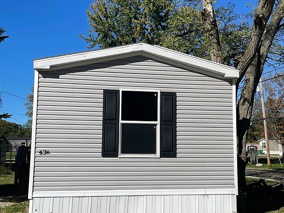2nd image of 6621 W Ridge Rd Lot 43W