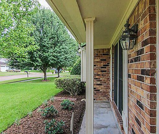 A closer look at the charming front porch. A great place to relax and enjoy your new neighborhood.