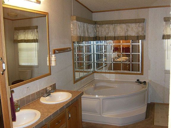 Master bath is very large with garden tub and seperate shower.