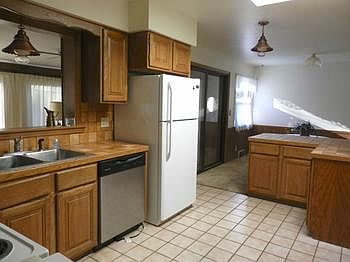 Nice kitchen with all major appliances, updated cabinets, countertops & ceramic tile floor