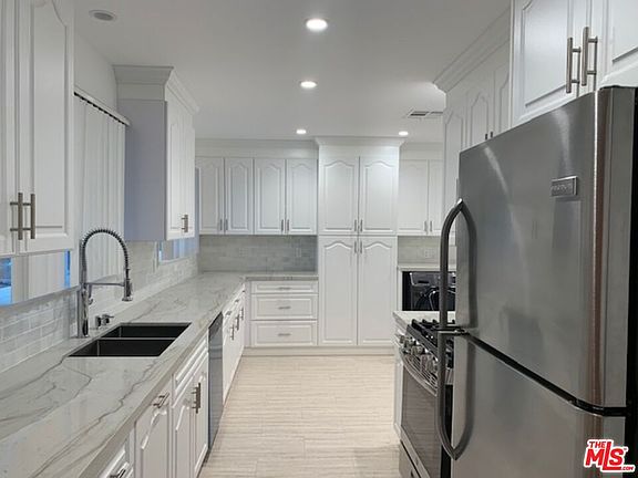 2nd image of 6043 S Garth Ave