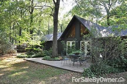 Back View of House
						:
						Nice patio with koi pond, fenced, shade trees