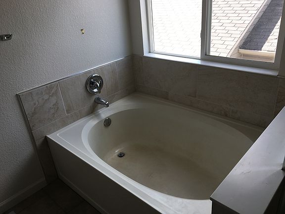 New tile in master bath & shower, new fixtures