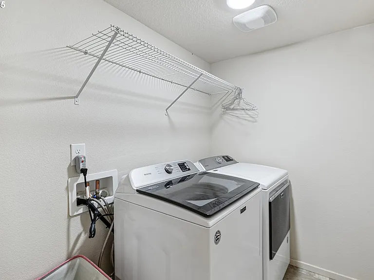 2nd floor top load washer and dryer