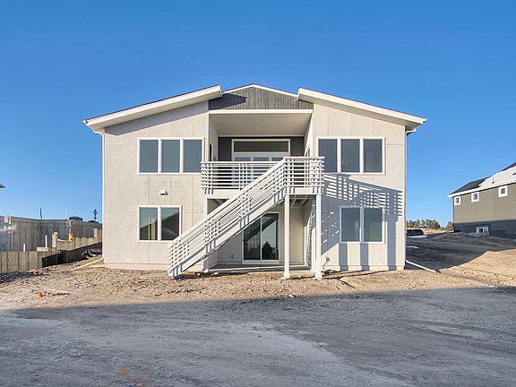 Walk-Out Rear Photo representing home to be built and may demonstrate optional features