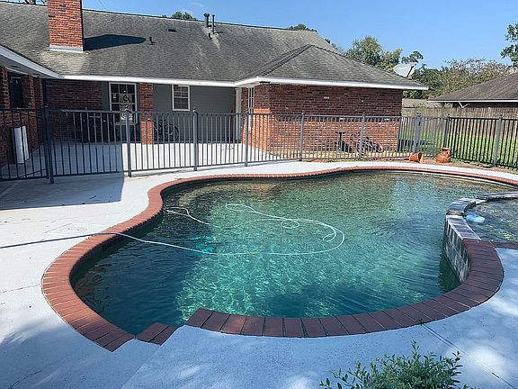 Pool with separate fence