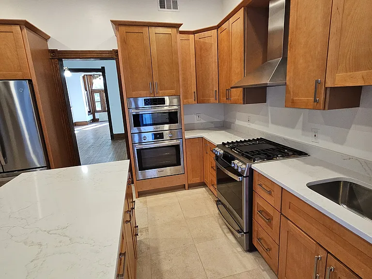 1st floor: kitchen (partial view), showing dining and living room