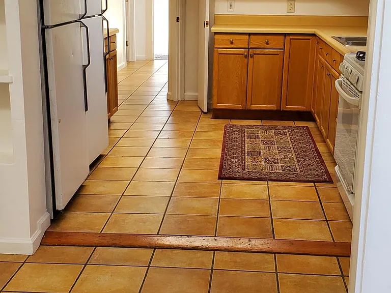 entrance to kitchen. includes 2 refrigerators, gas stove and lots of counter cabinets. 2 additional pantries.