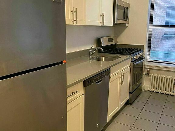 2nd image of 64-20 Saunders St #202