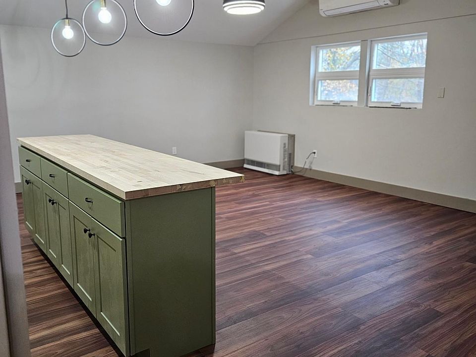 Island with storage good natural light.