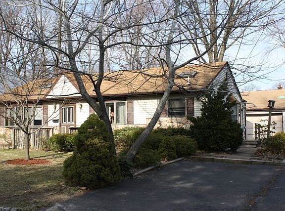 2 CAR GARAGE 1/2 FINISHED WITH OFFICE OR BONUS ROOM