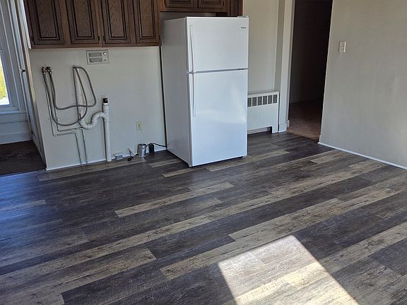 Tons of cabinet space, plenty of room for a kitchen table.