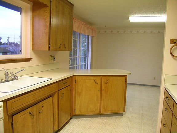 Kitchen with view of backyard.