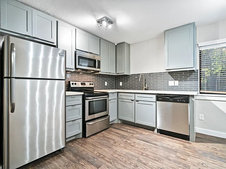 3412 Graustark St — Photo 2