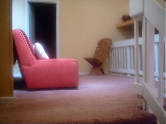 Open loft area allows extra seating.