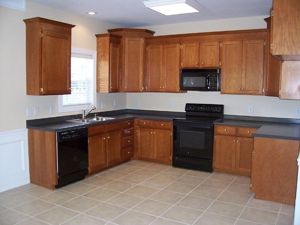 dishwasher, fridge, and garbage disposal