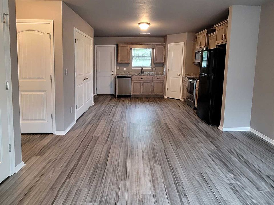 Kitchen, dining, and living room areas