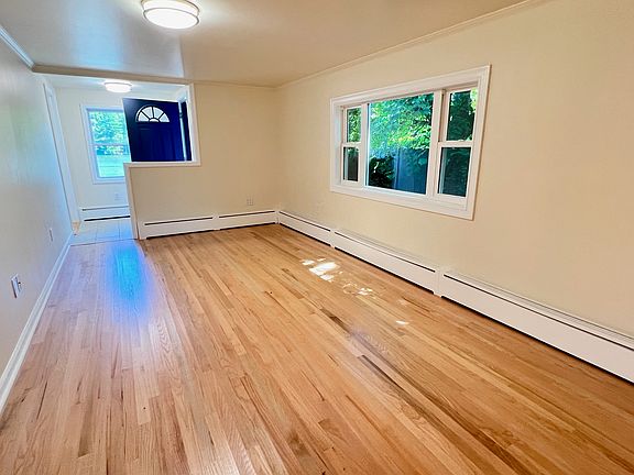 Living Room with Entryway in background