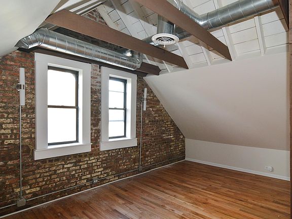 Lofted top floor bedroom. 12'+ Ceilings