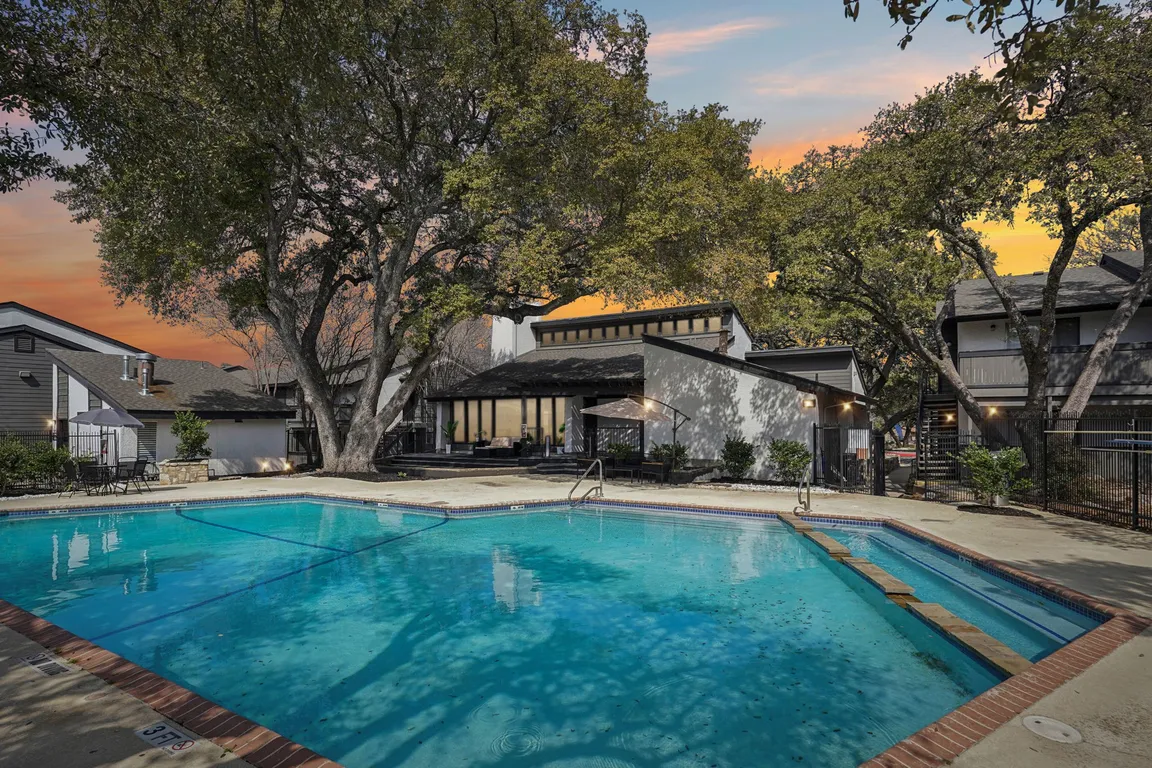 Unwind at The WerX Apartments, where vibrant living meets serene outdoor spaces. Dive into a refreshing pool surrounded by lush trees, perfect for relaxation. Join a community that prioritizes comfort and style. Schedule your visit today!