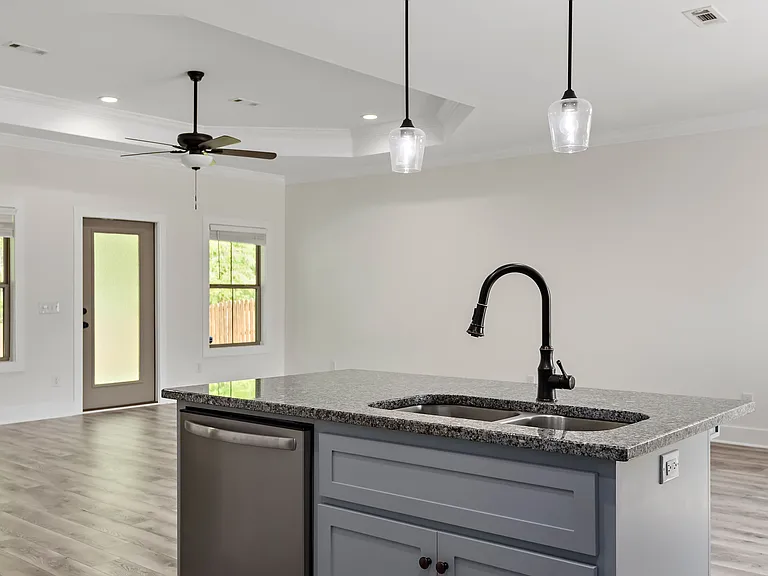 Kitchen island with pull down faucet