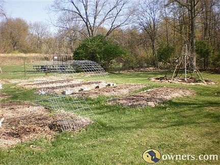 A few raised beds-not permanent, can be raked out.