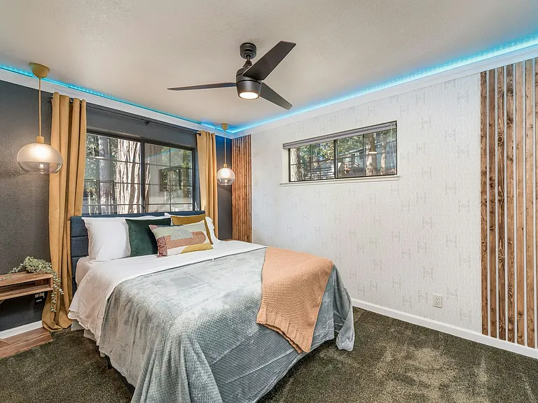 Bedroom 1 with accent lighting and remote controlled fan
