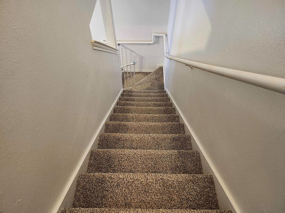 Step into elegance with this beautifully designed stairway, offering comfort and style.