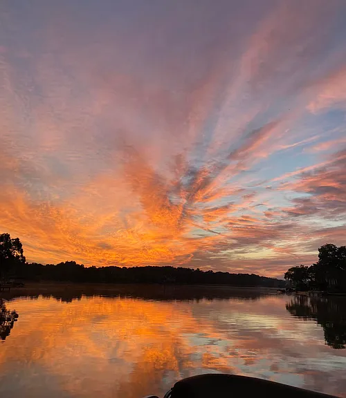 Beautiful sunsets on Lake Windward. Rent a pontoon or try your luck at fishing.