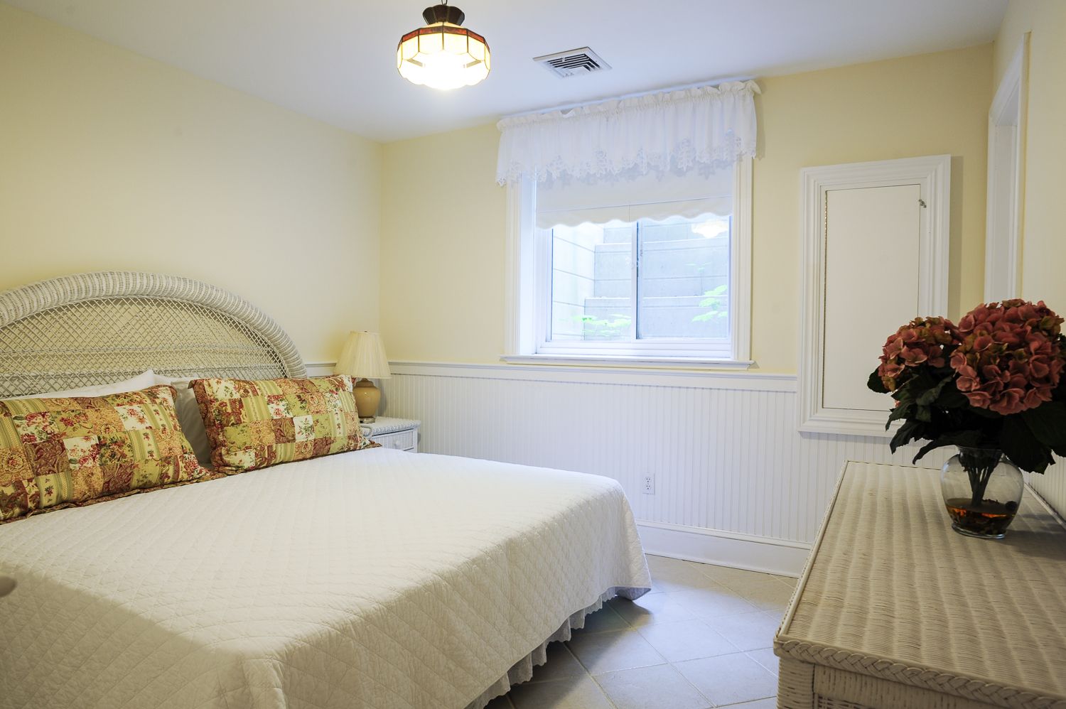  Lower level bedroom with king bed and adjoining bathroom