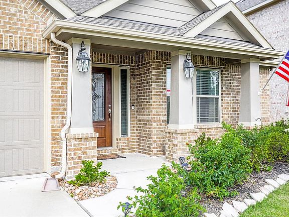Charming all brick entry with porch