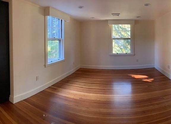 Panorama of living/ dining room and kitchen