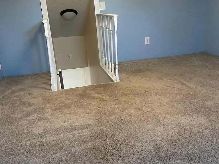 Flexible living space - carpeted, electrical outlets