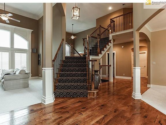 Beautiful Center Staircase with front and back entry. Wide planked hardwoods, soaring ceilings and so much more.