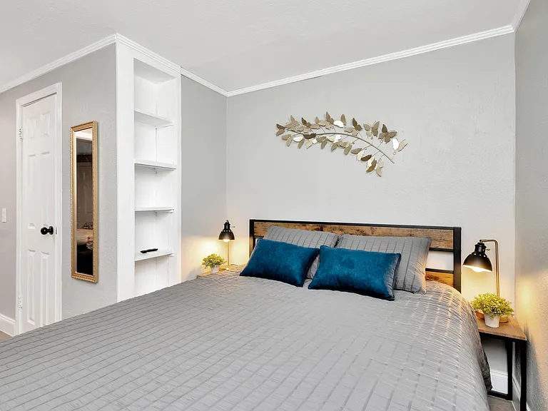 Dreamy Zen Bedroom with Queen size bed with 5-star rated 12" Memory Foam mattress with premium sheets and a duvet covered plush down comforter.
