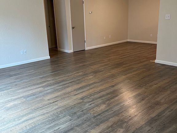 Family room looking into dining area with coat closet