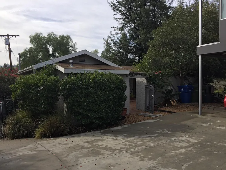 1 covered parking spot available here under carport, 10 feet away from patio gate!