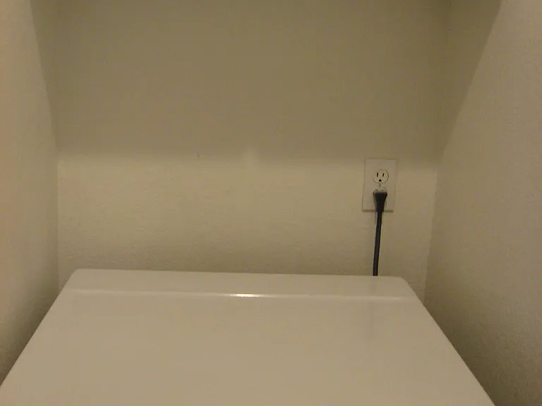 small laundry area off the garage