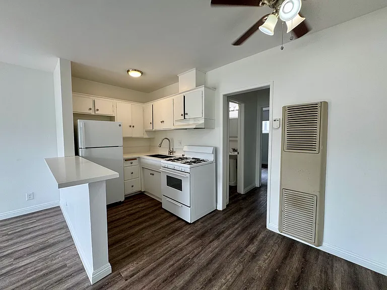 All photos are actual photographs of a comparable unit with a similar floor plan and finish style, shown for reference only.