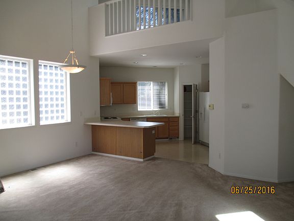 Kitchen from Dining Area Showing Loft