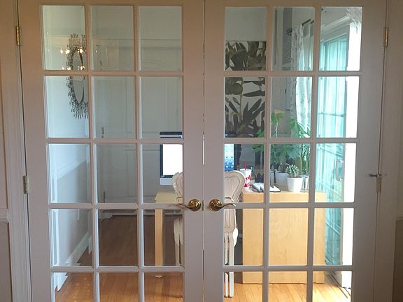 Double french doors to office/study/den.